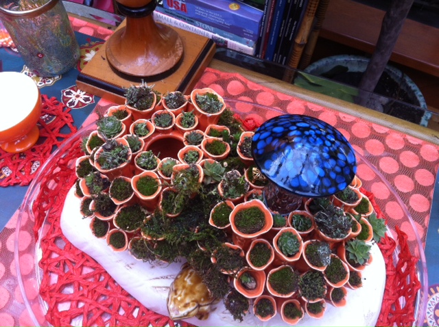 Orange glass centerpiece $225