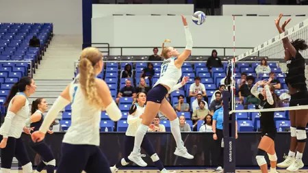 Sofiia Snitsarevych attacking a volleyball