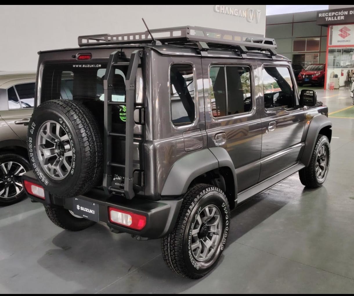 Suzuki Jimny 2025 with rooftop carrier and ladder