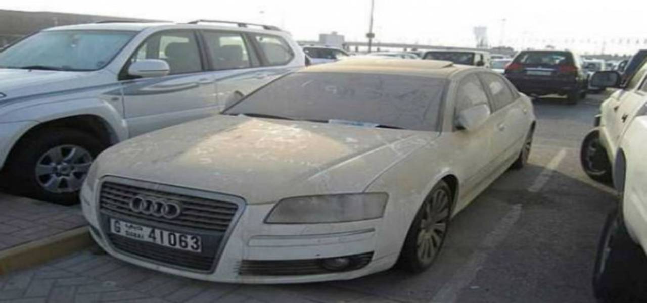 "Luxurious Cars Resting In Dust"Dubai's Supercars Scrap Yard
