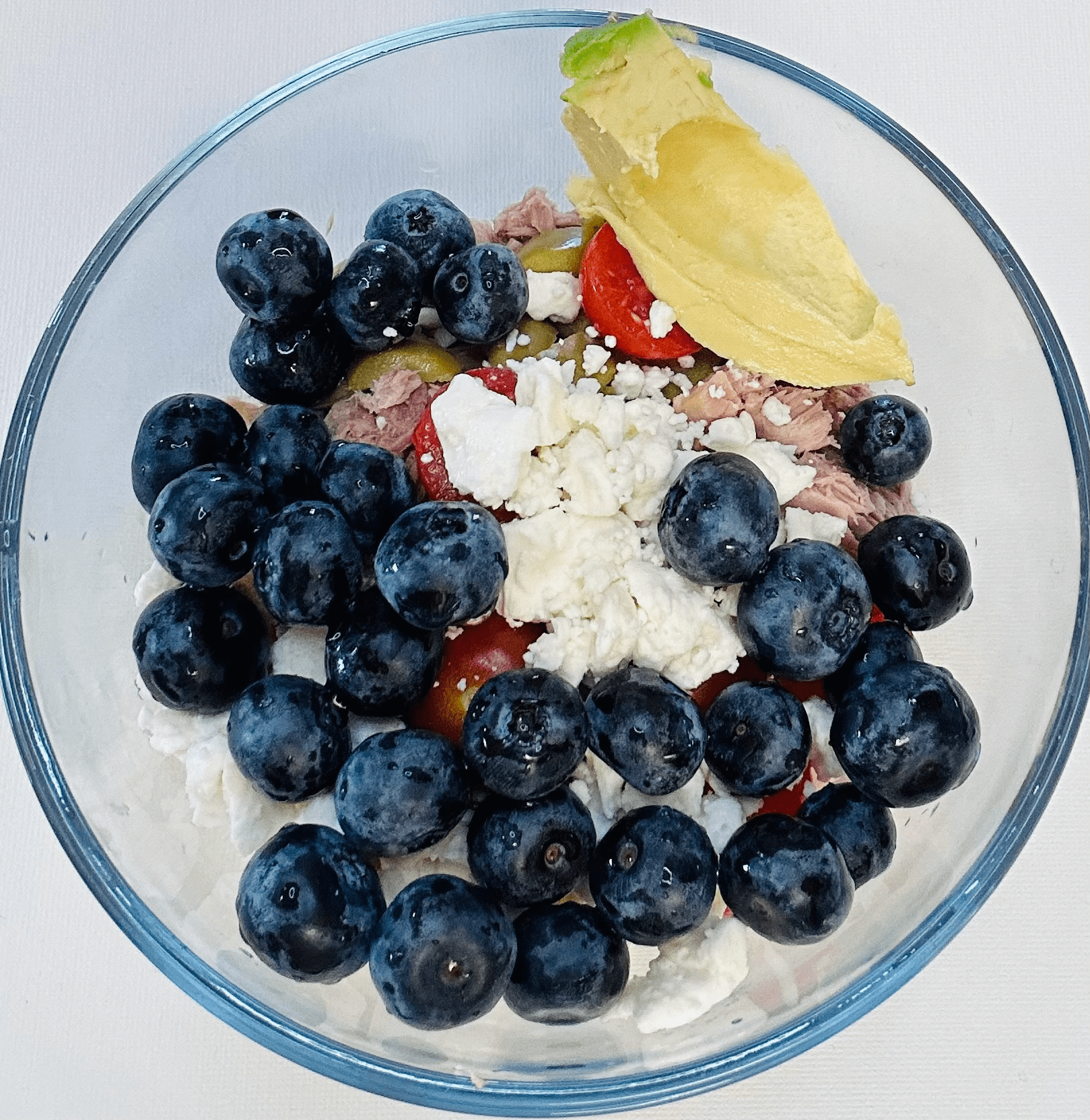 chickpea salad with avocado, blueberries, feta, tuna, tomatoes and olives