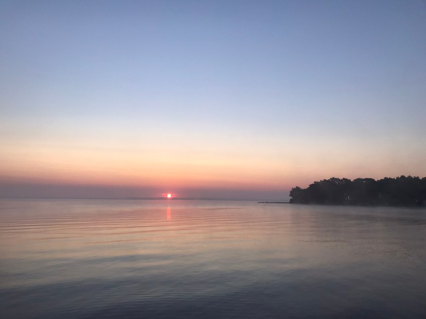 Sunrise over a lake.