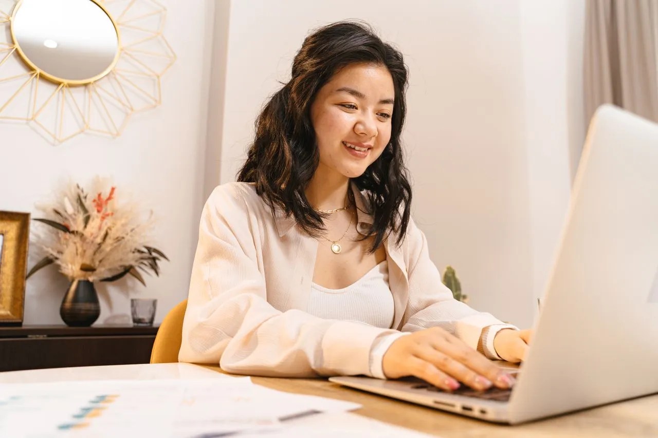 Woman using a laptop for short-term career training