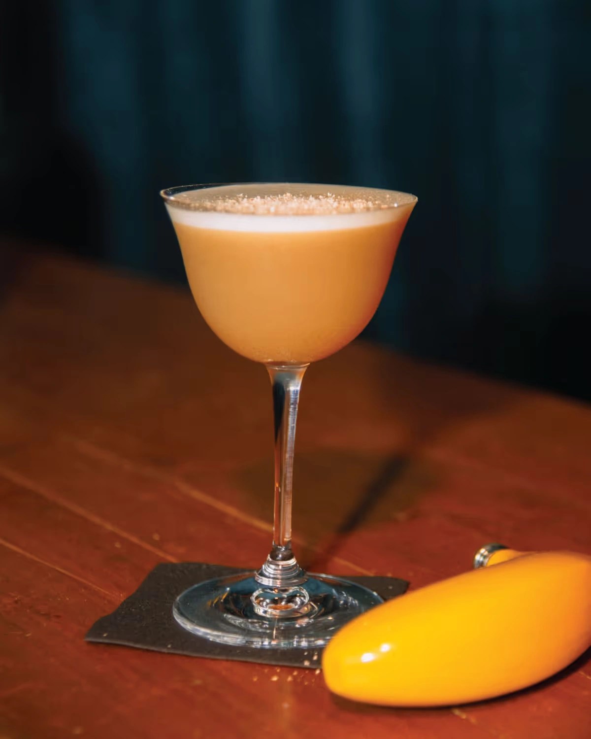 Still Austin’s Bananas for Nancy source photograph, a pale cocktail in a stemmed glass