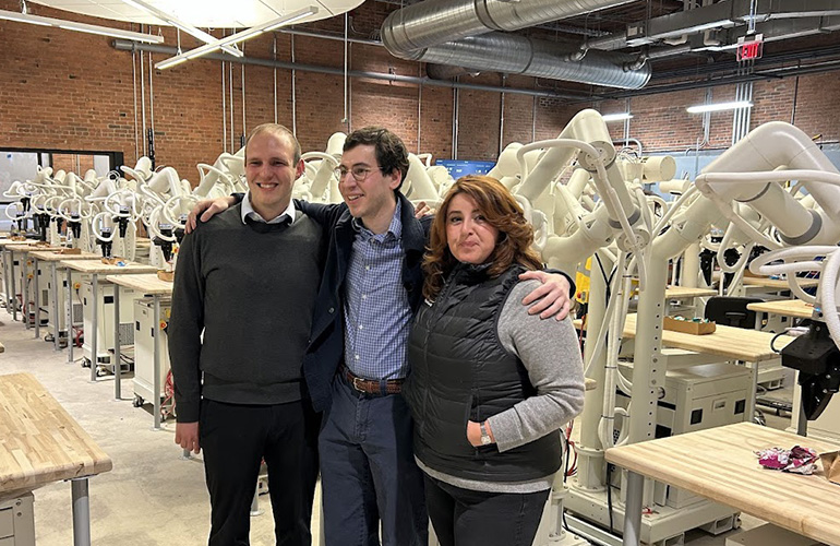 From left to right: Tutor Intelligence CTO Alon Kosowsky-Sachs and CEO Josh Gruenstein with Alla Simoneau from the AWS Generative AI Innovation Center, at Tutor’s Digital Factory.