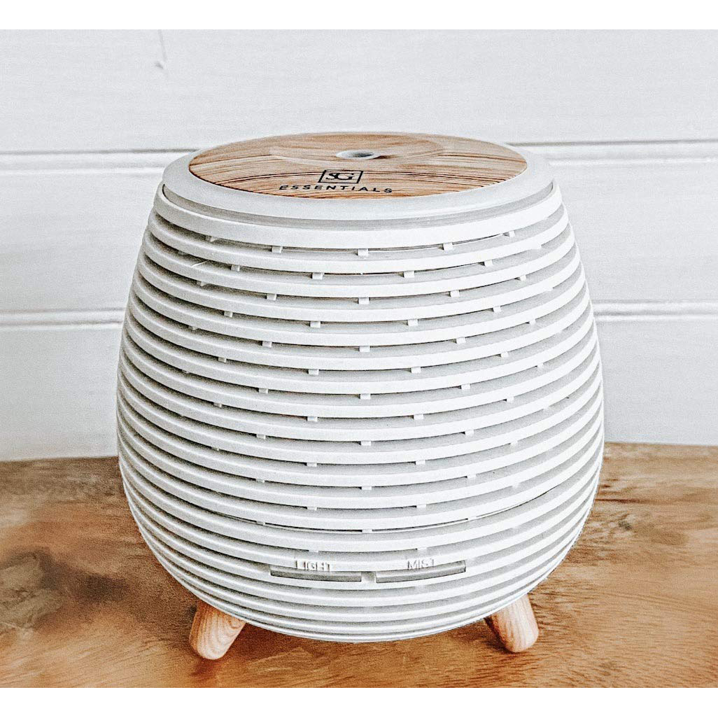 white round aromatherapy essential oil diffuser with linear detail