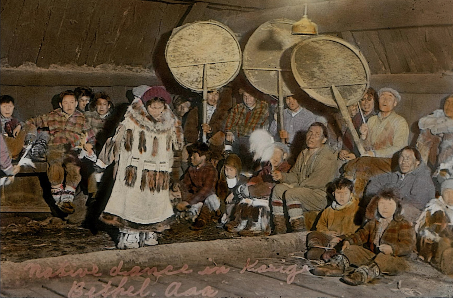 A rare lantern slide of Yup’ik dancers in a qasgi in Bethel, between 1930 and 1938. (National Museum of the American Indian)