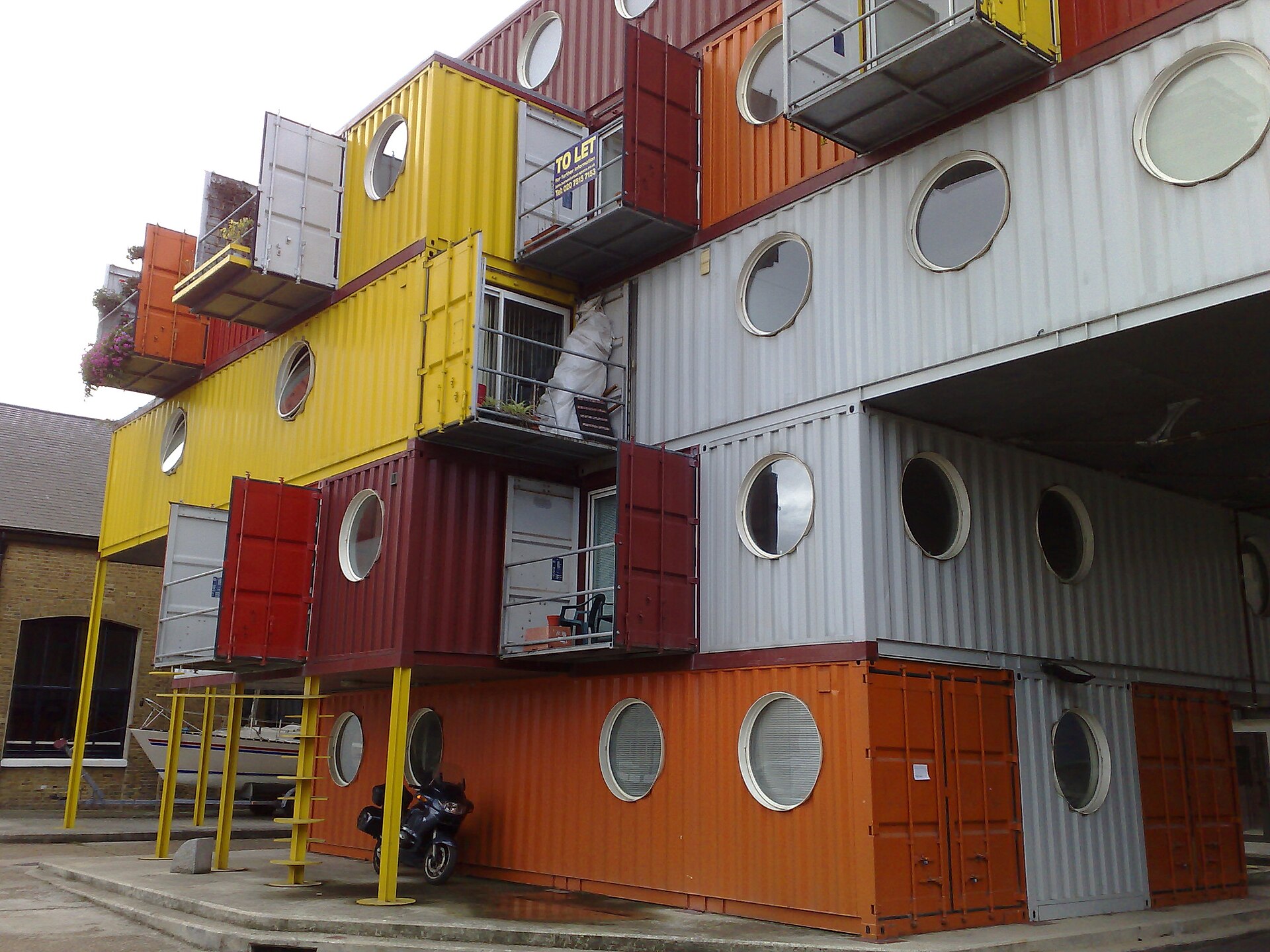 A large set of multipurpose office spaces in a building constructed from cast-off shipping containers