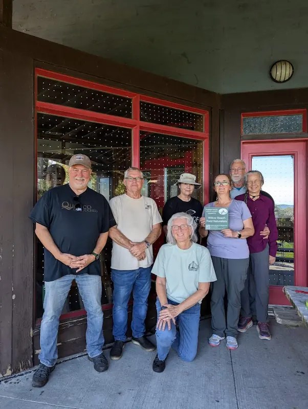 Group photo of volunteers who installed bird collision deterent stickers at Presqu'ile Park