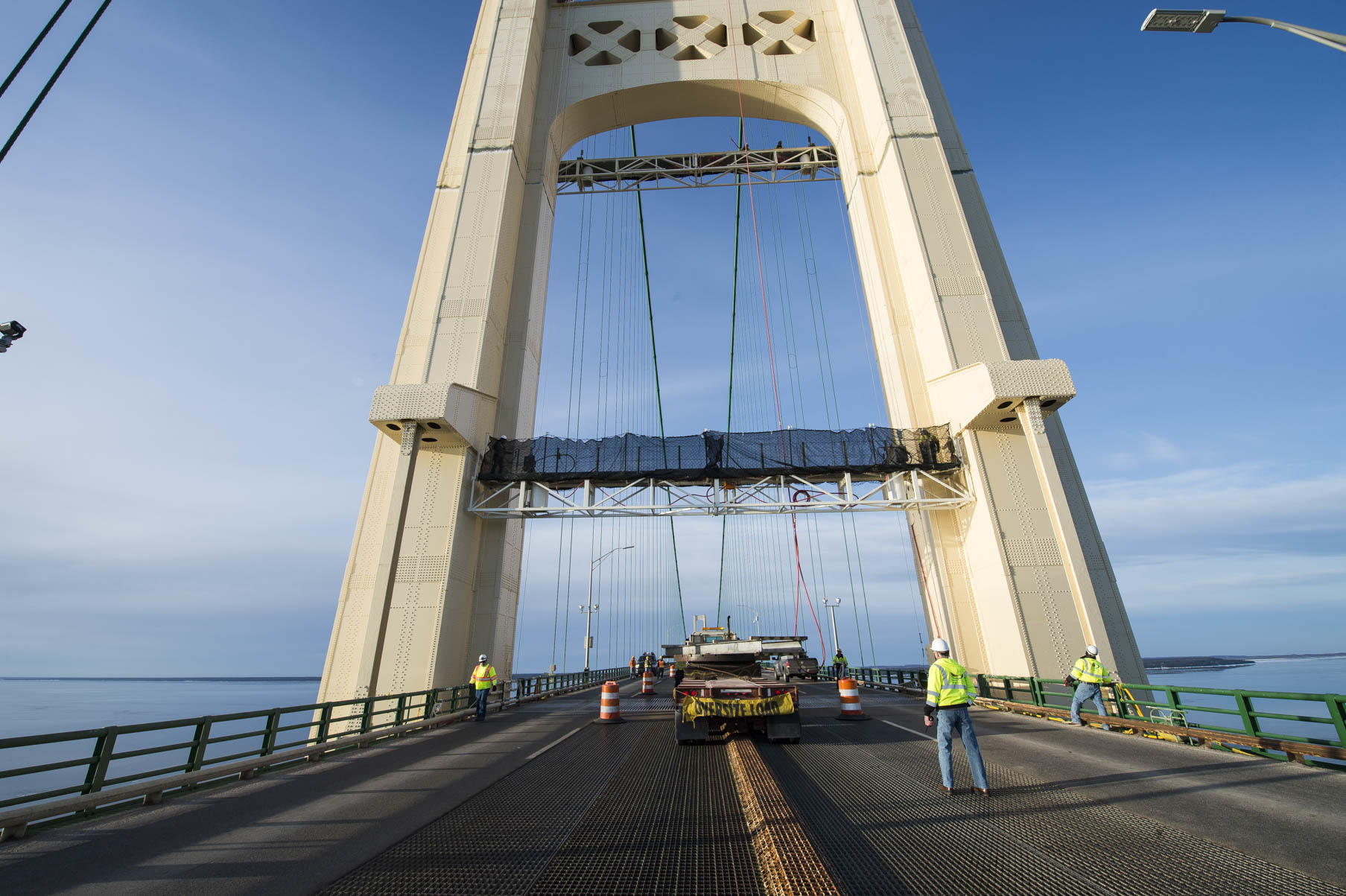 Raising of painting platform on the north tower of the Mackinac Bridge, contractor Seaway Painting