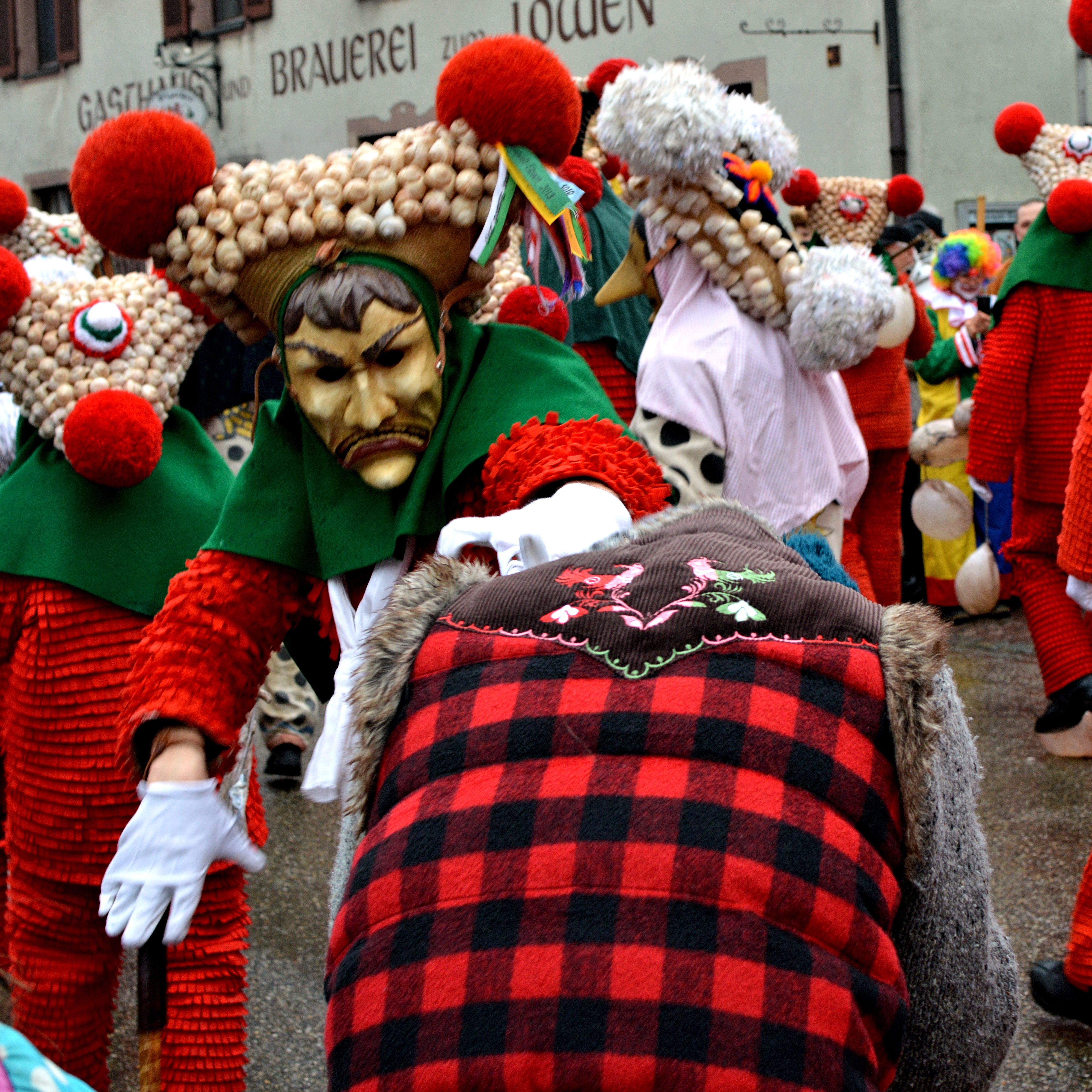 Not entirely sure what's happening, I think they're fighting over her hat!