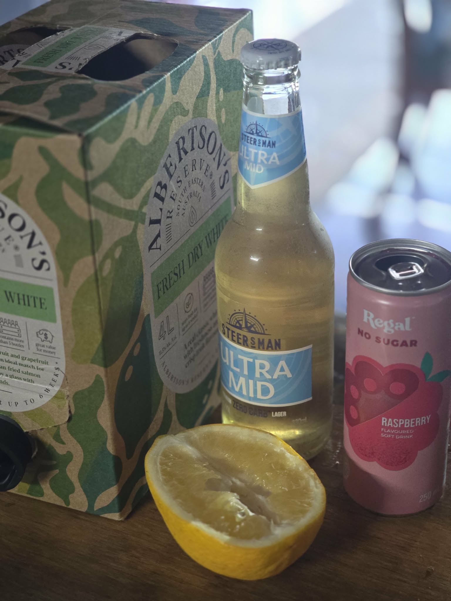 A wine AND beer cocktail with raspberry and lemon