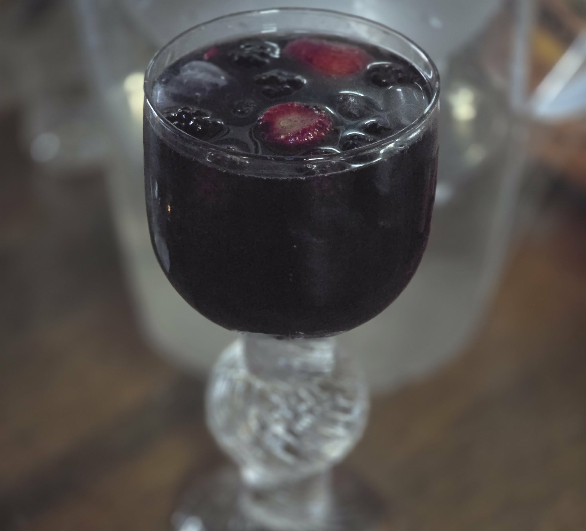 Margarita with wine, blackcurrant liqueur and frozen berries