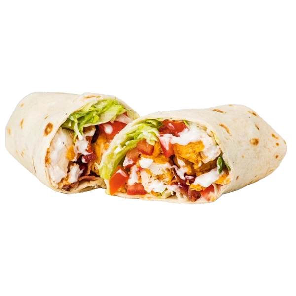 Fresh chicken wrap with crispy chicken, lettuce, tomatoes, and creamy dressing, captured in a close-up on a white plate.