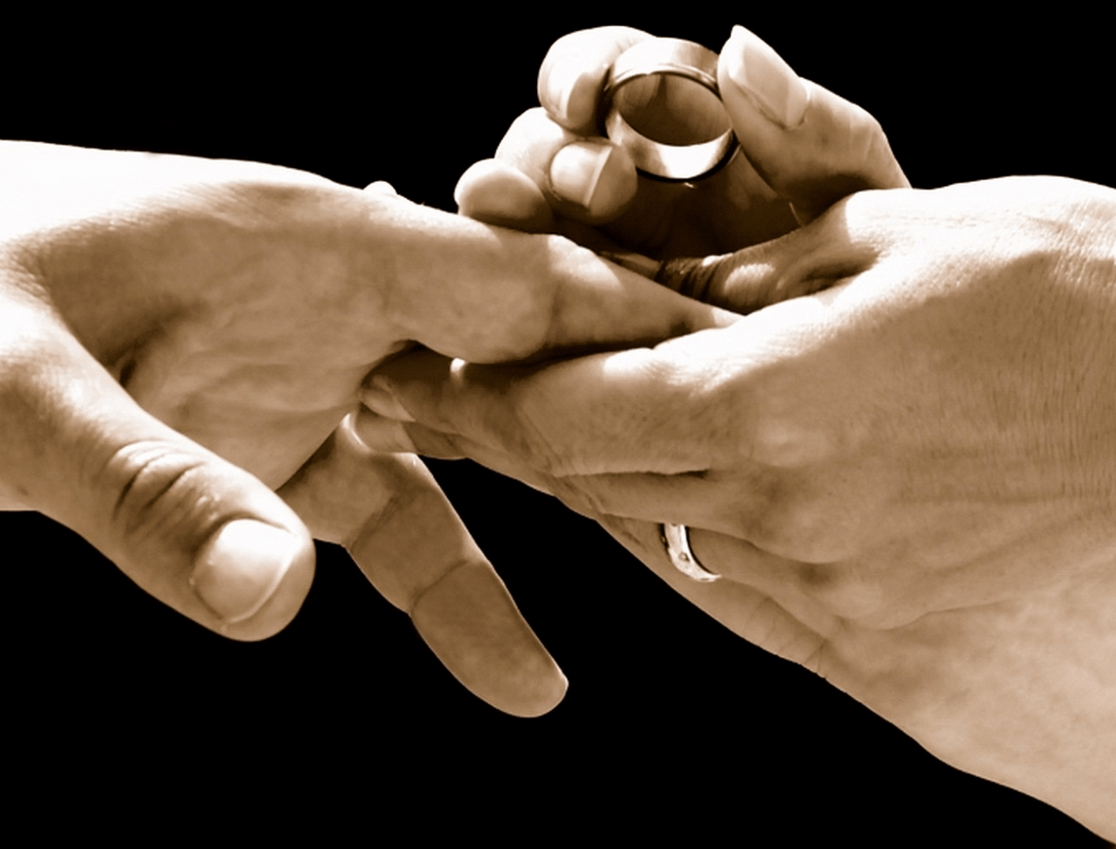 hands with rings - Flickr CC