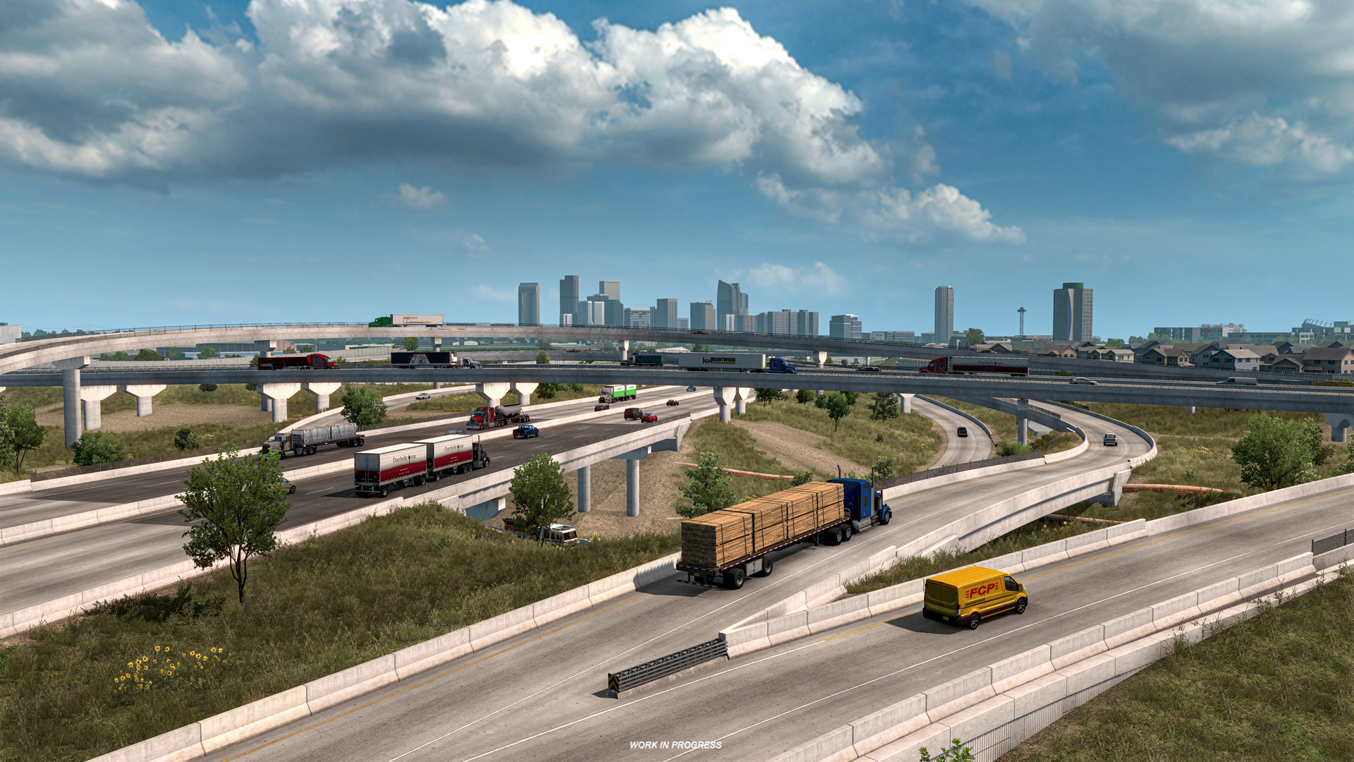 A busy multi-level highway interchange with trucks and cars driving in various directions, set against a city skyline under a partly cloudy sky. Greenery and grass surround the roads.