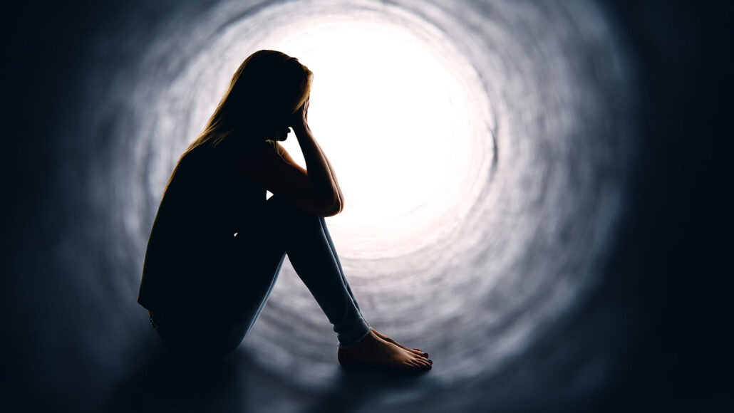 post-traumatic stress disorder image of person in a tunnel in stress
