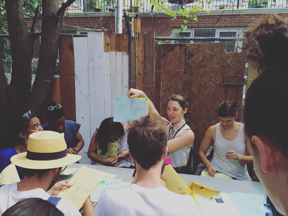 Book binding class at the Bushwick Art Book & Zine Fair 2016. July 2016. Photo by Michele Witchipoo.