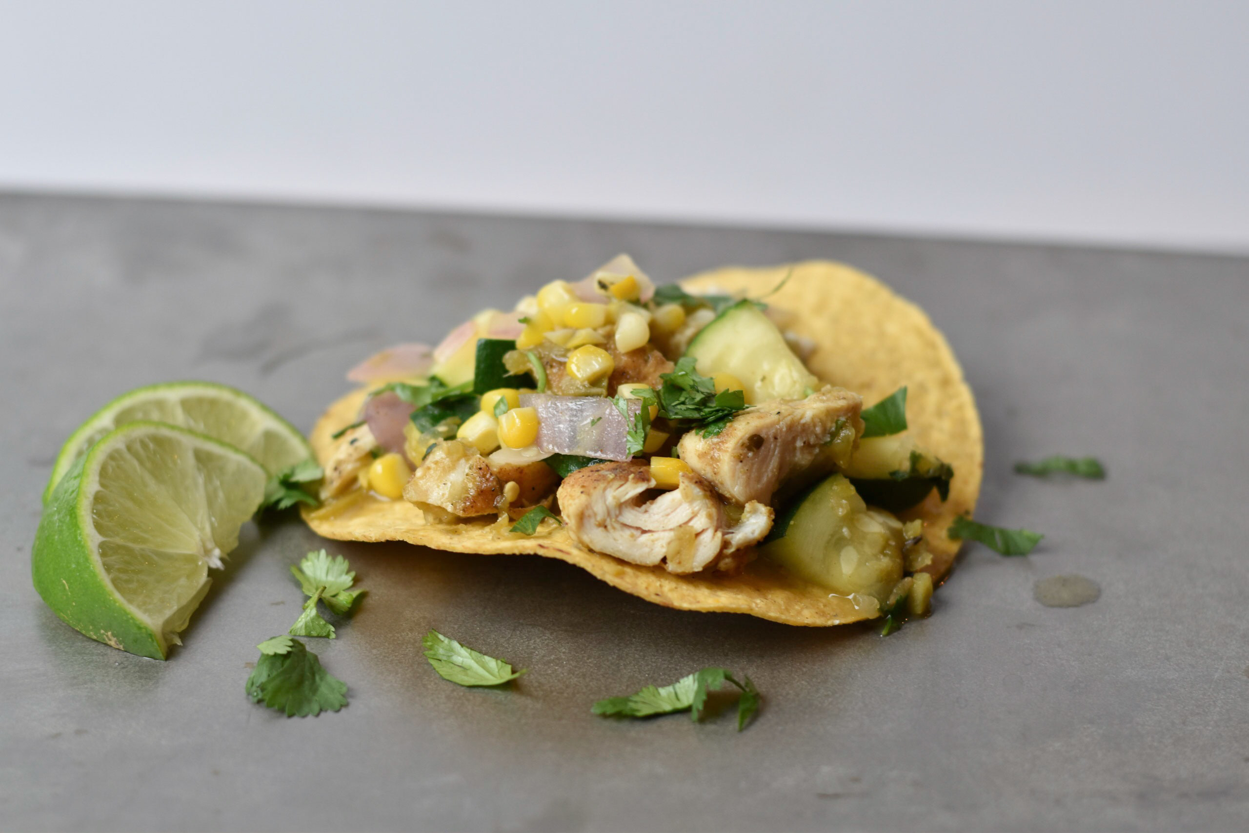 Sweet corn, zucchini, and chicken tostadas
