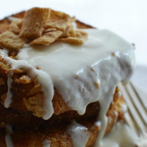 sliced toast topped with cereal and white glaze