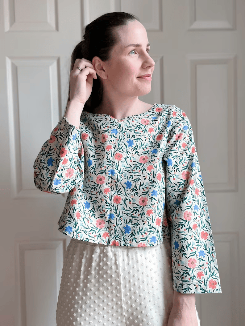 a woman wearing a long sleeve cotton floral blouse sewing pattern 