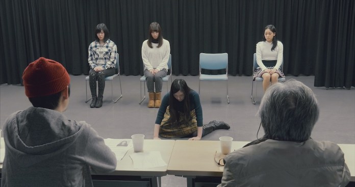 見栄を張る