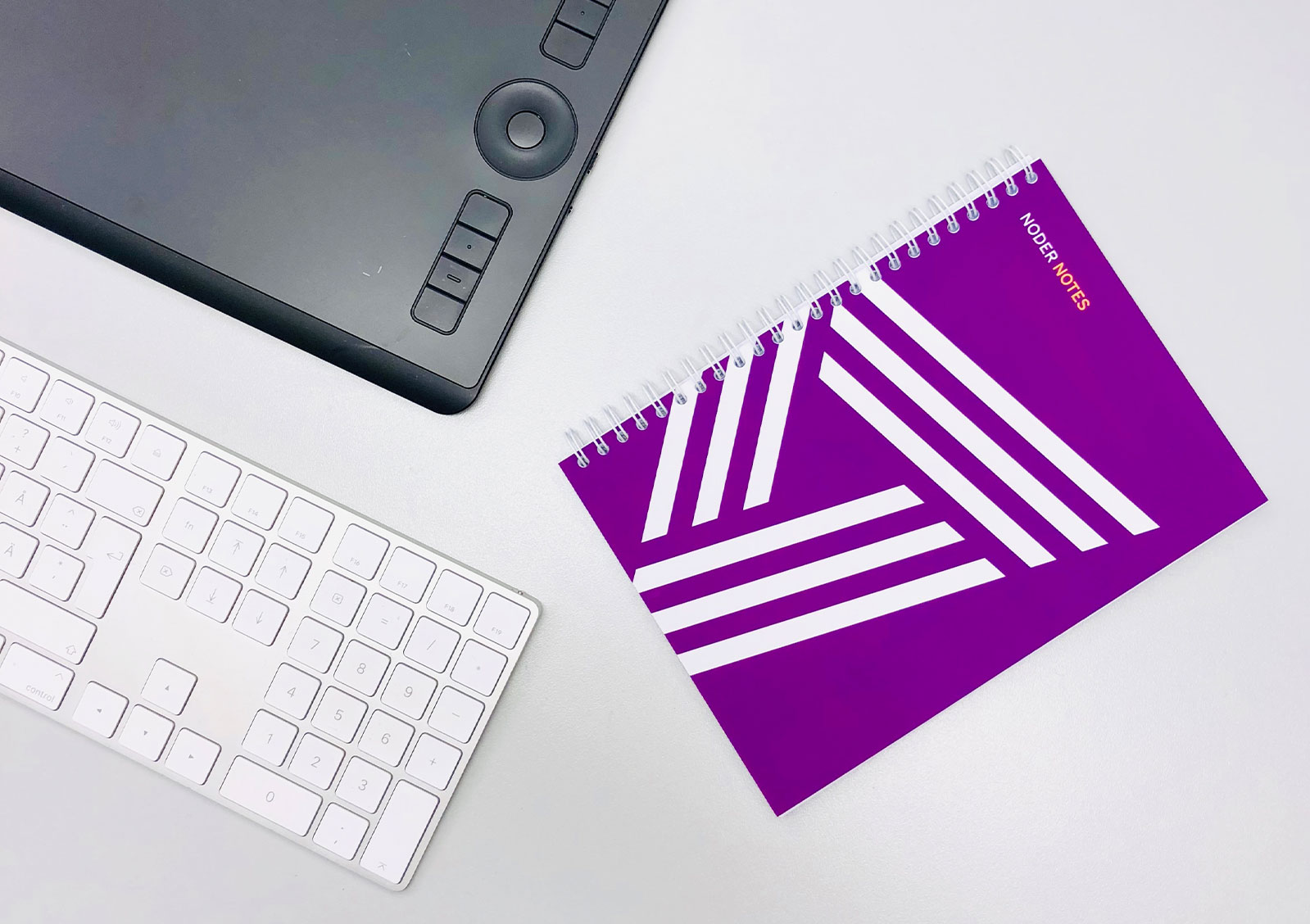 Overhead shot of a Avinode Group notebook on a desk