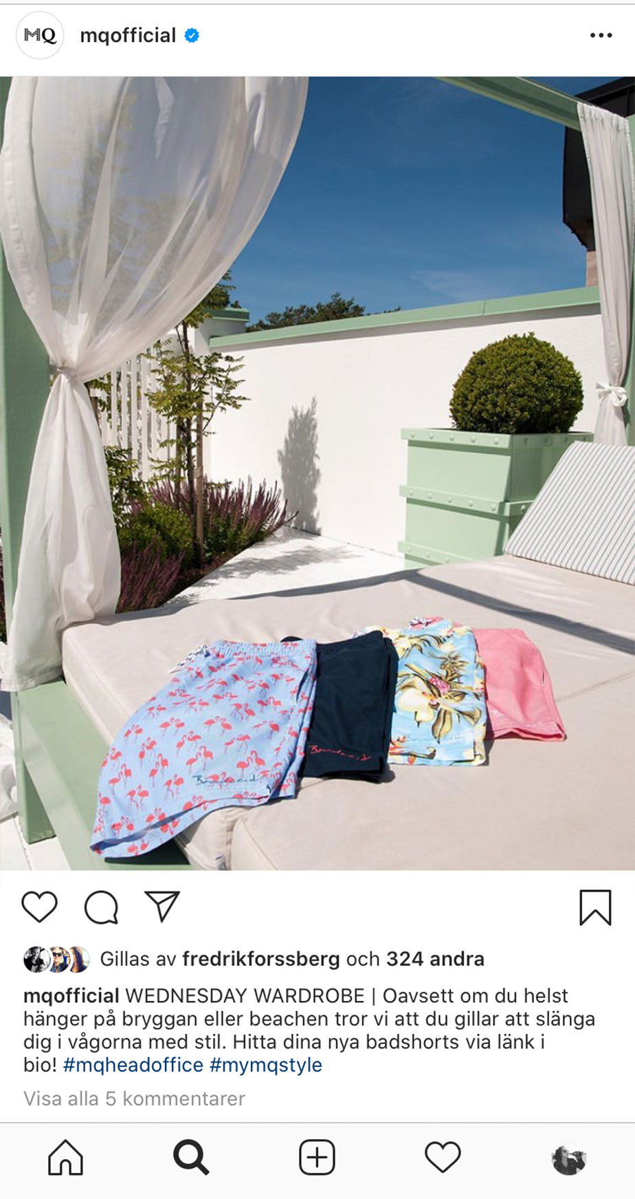 Instagram post of a display of mens swim shorts on a sun bed.