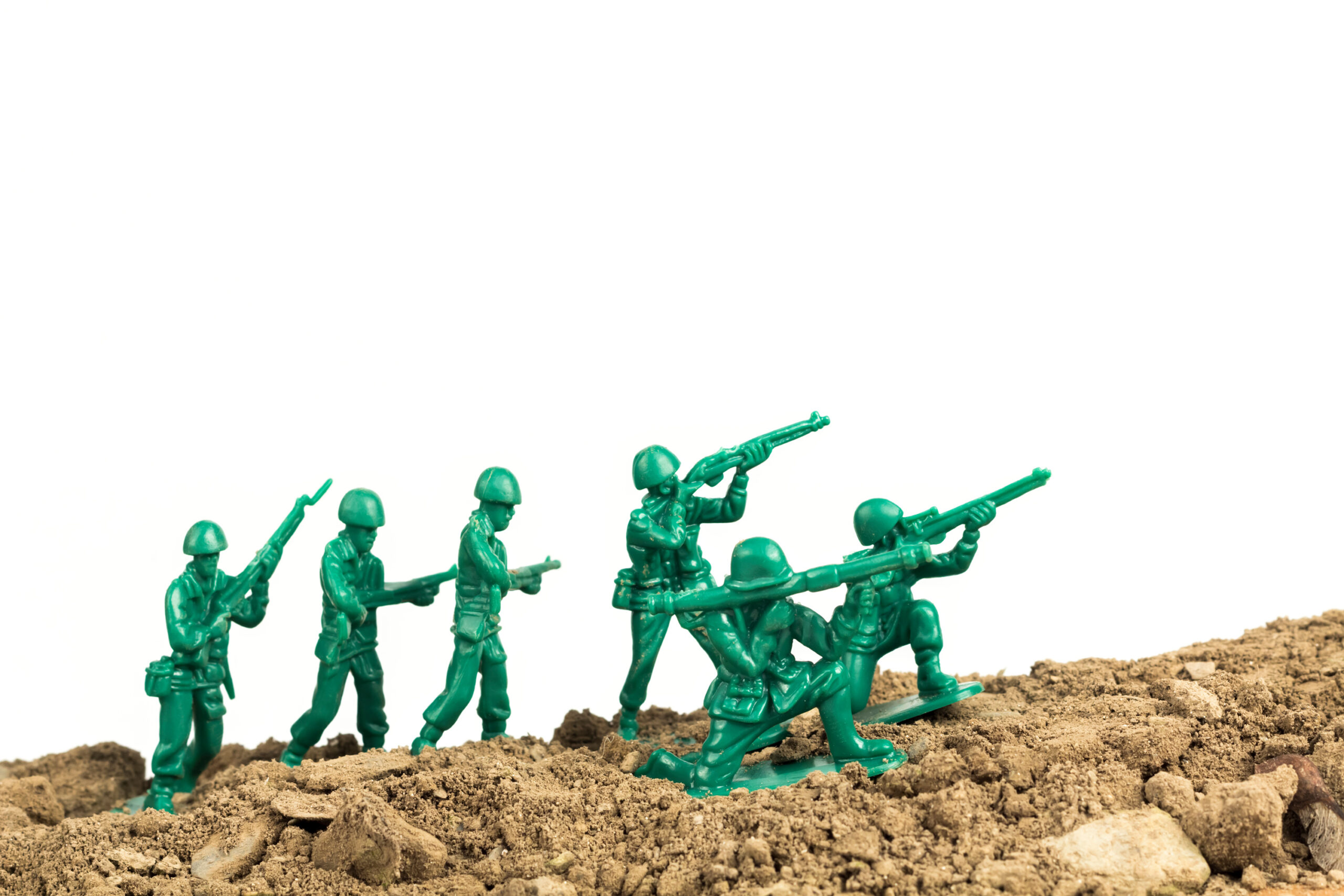 Toy soldiers crest the hill and prepare for the next battle.