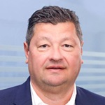 Headshot of Stephane Fund, CEO of Workz, newly acquired by Trasna
