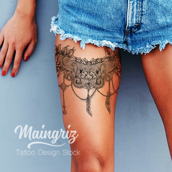 feathers and sexy lace garter tattoo design