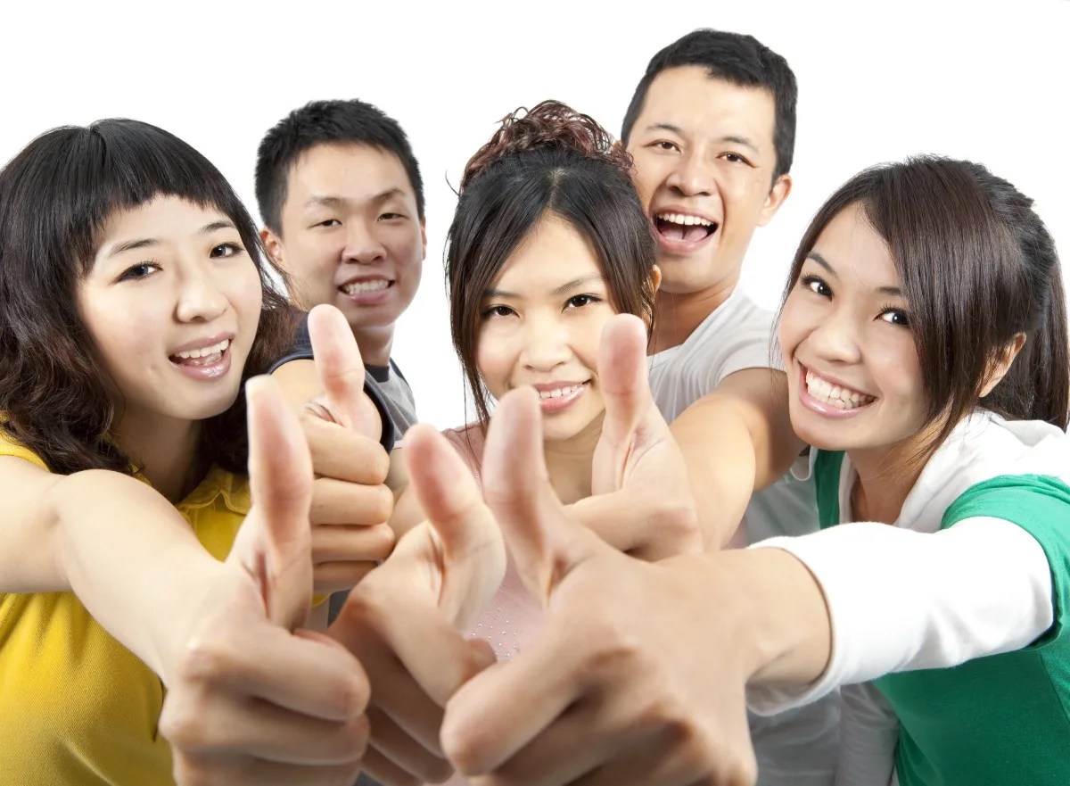 Young asian Group with thumbs up
