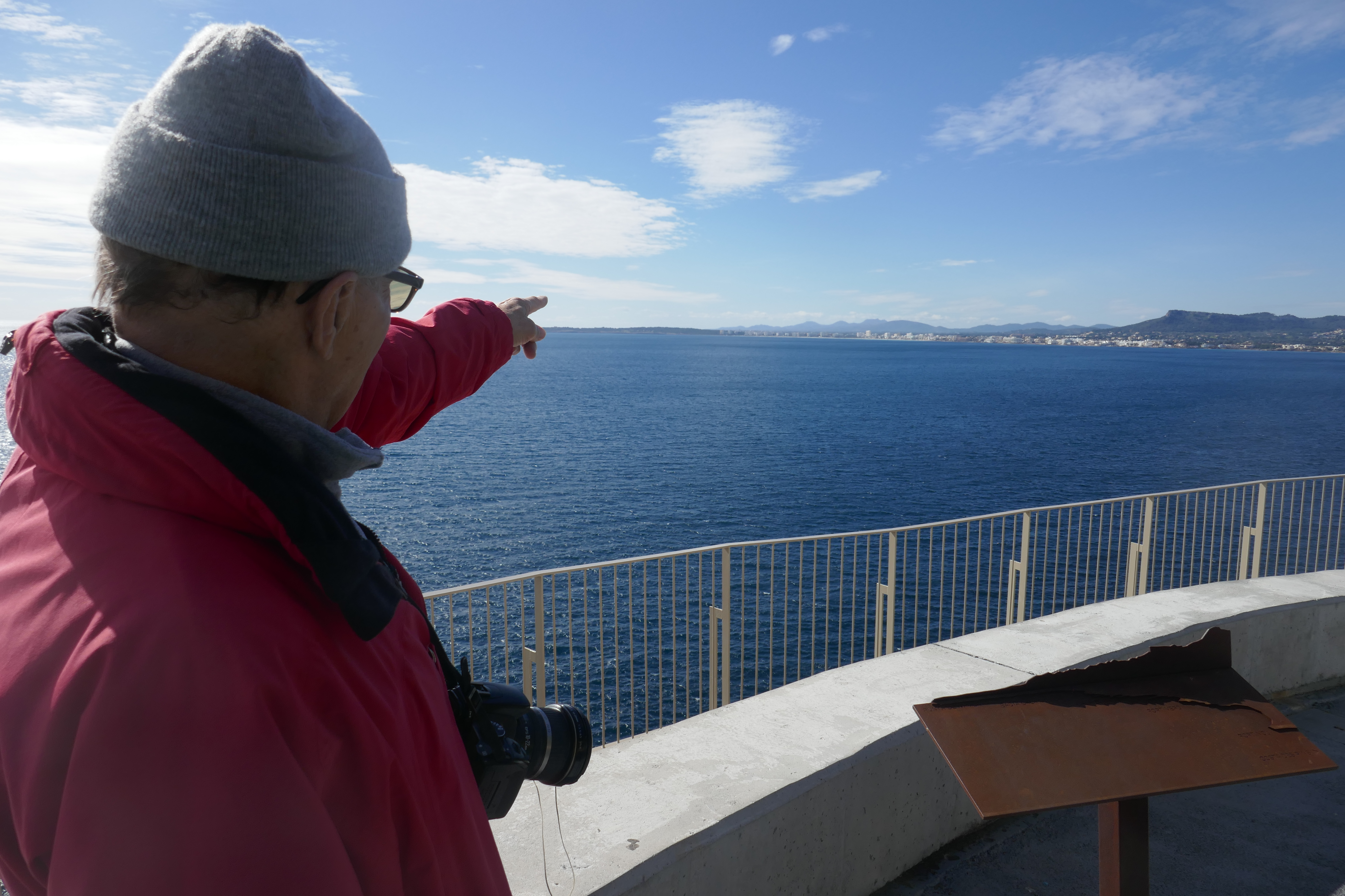 Hubby is pointing at our apartment building across the bay