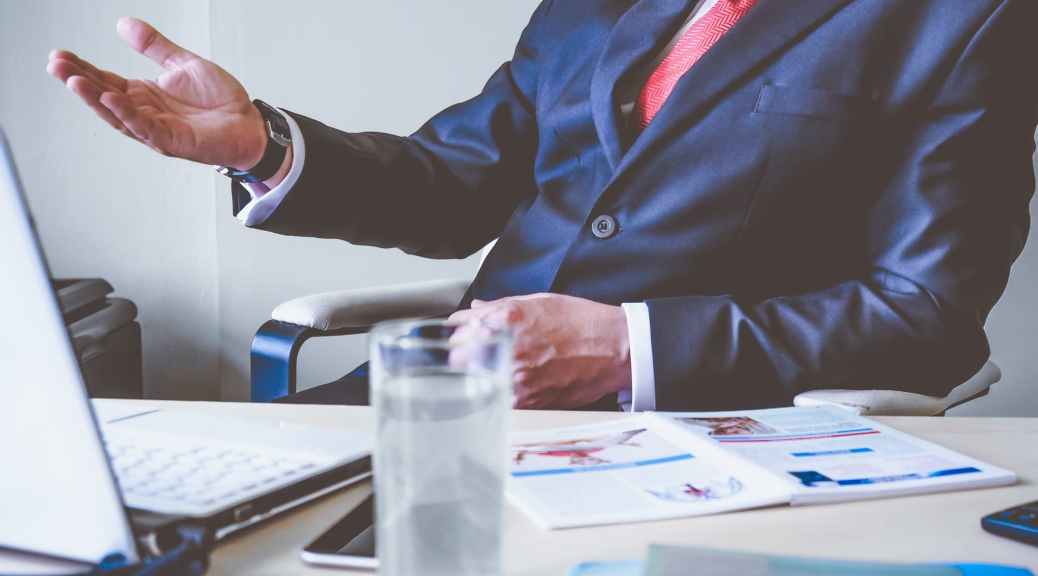 image of CEO at table