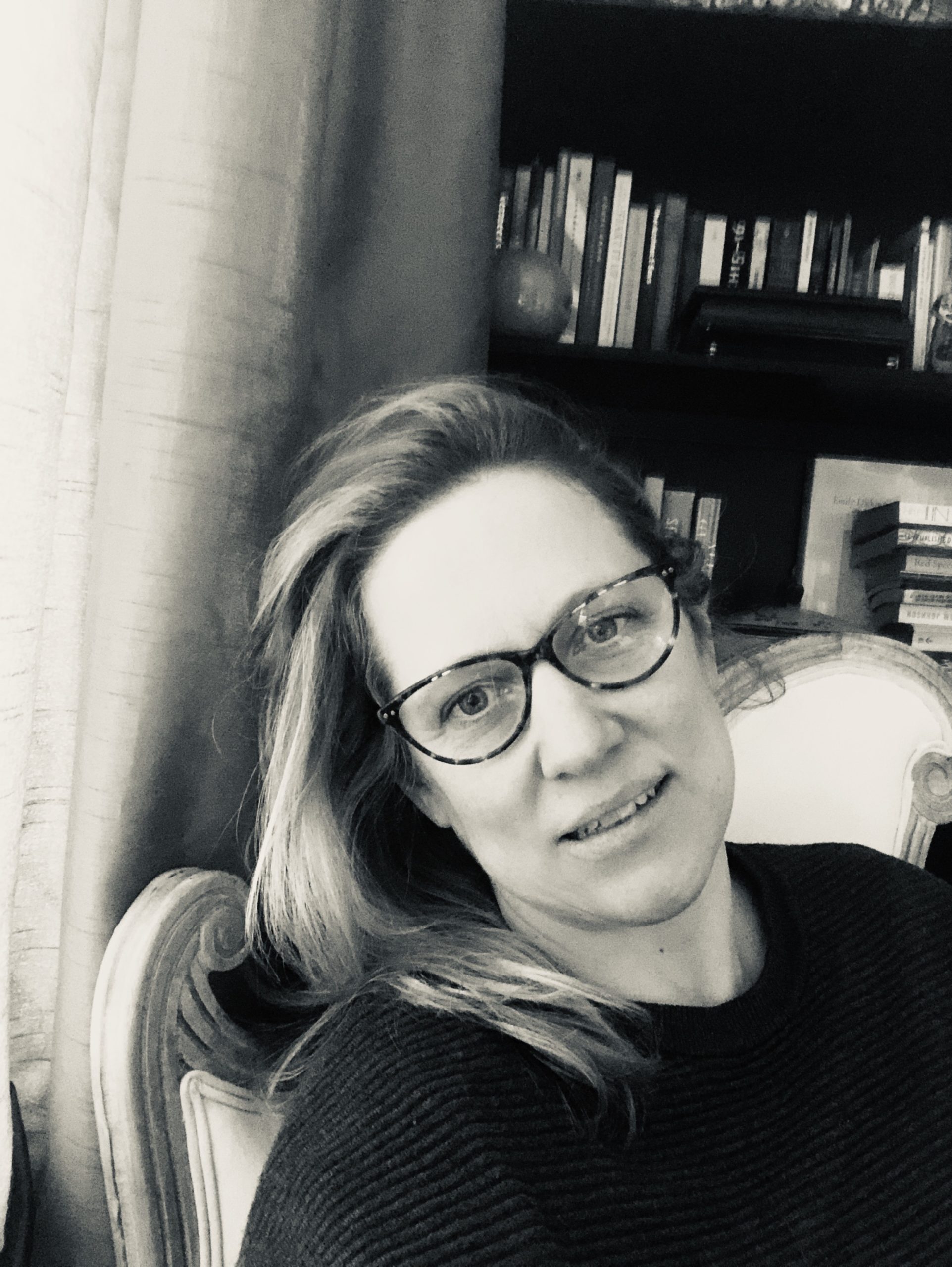 A black and white photograph of the writer Natasha Randall.