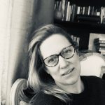 A black and white photograph of the writer Natasha Randall.