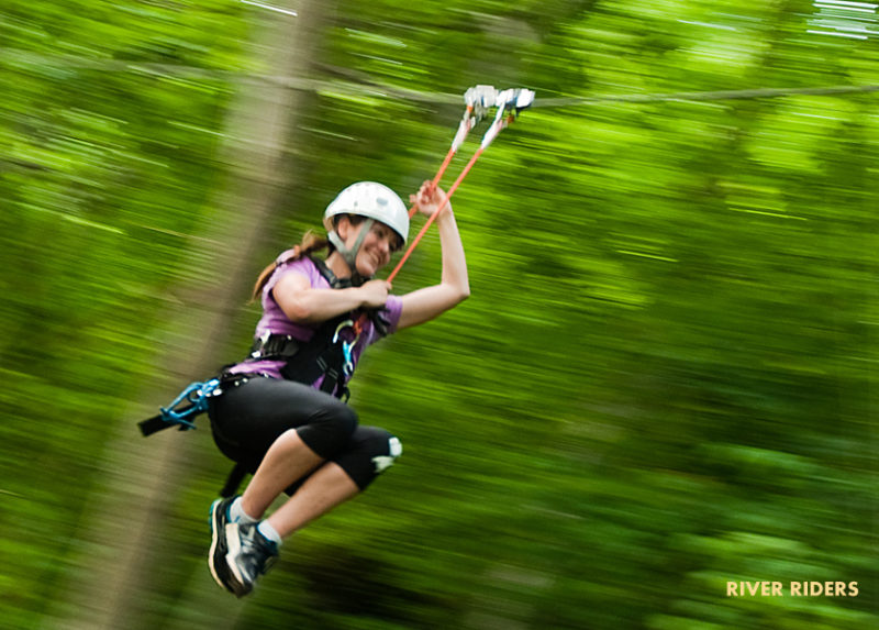 Guest on zip line at River Riders, Harpers Ferry, WV