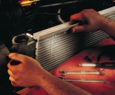 replace radiator to repair coolant leak