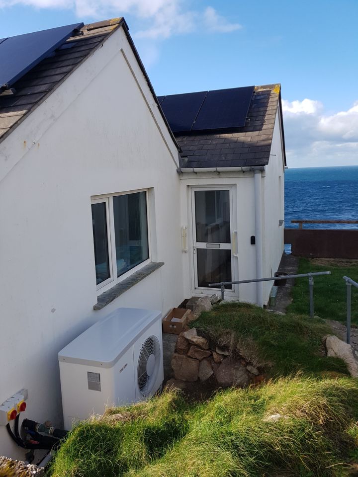 Heat Pump on exterior of home by the sea
