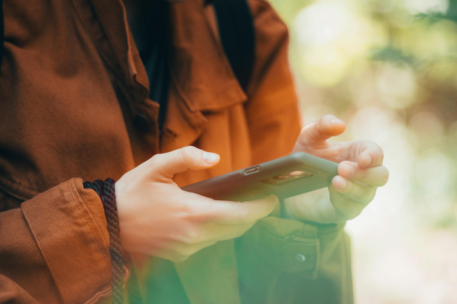 a person using a smart phone