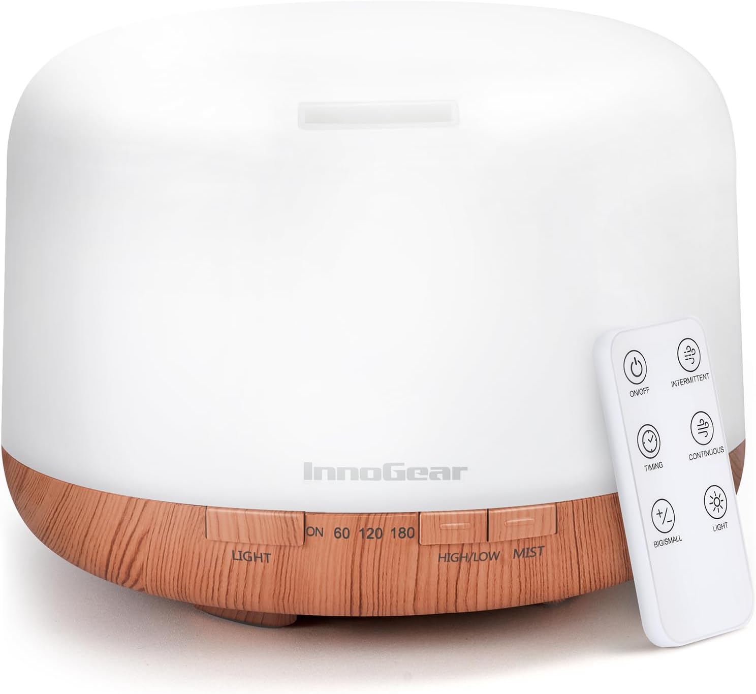 An essential oil diffuser is pictured with a remote.