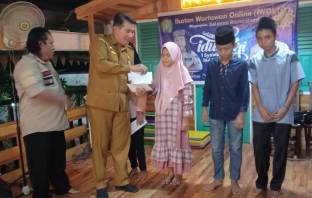 Kadis Kominfo Batu Bara Santuni Anak Yatim Bersama IWO ASTARA