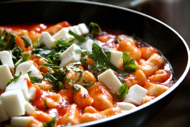 Ricotta Gnocchi With Basil Fresh Mozzarella Place gnocchi is boiling salted water.