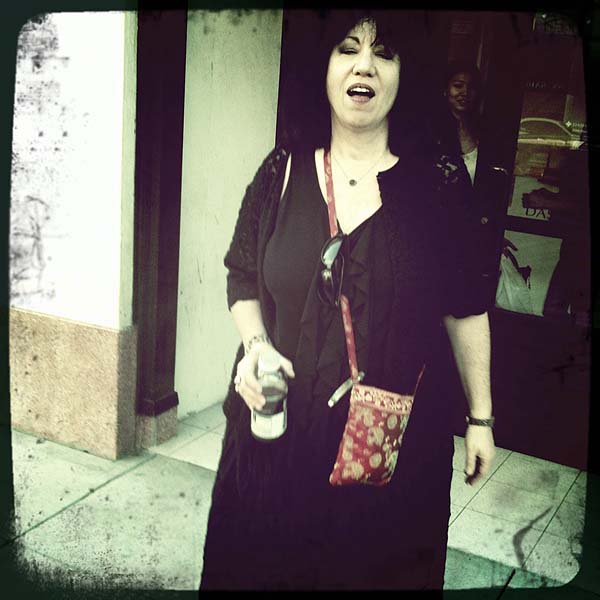Aviva coming out of a store (Hipstamatic)