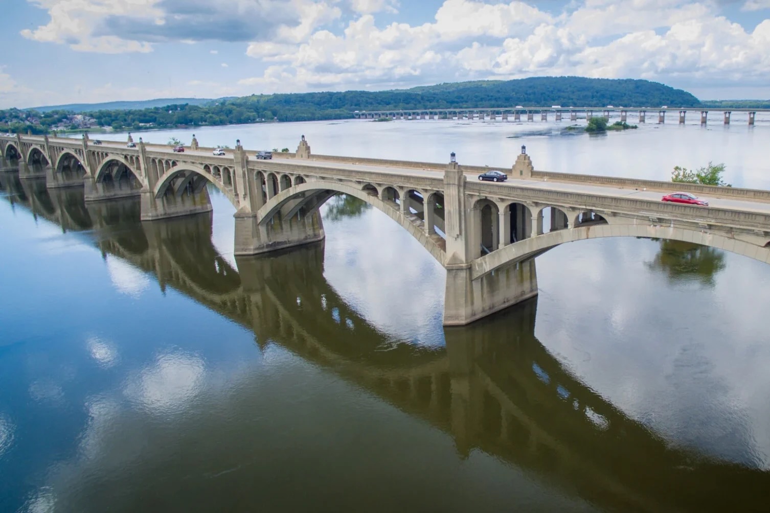 A bridge spans a wide river.