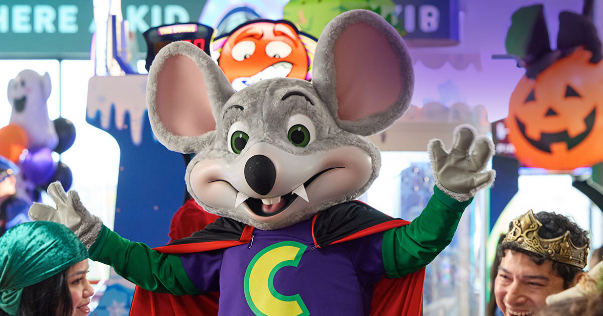 Chuck E. Cheese dressed like a vampire