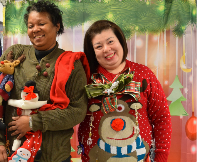 This red and green sweater features a grumpy cat face inside a wreath and the headline 'meowy . Here S How Ugly Christmas Sweaters Can Beautifully Support The Disability Community The Latest National Disability News