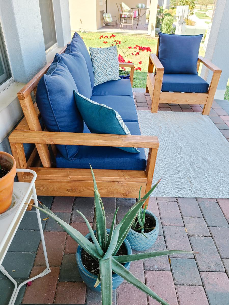 Outdoor sofa and chair with slanted back