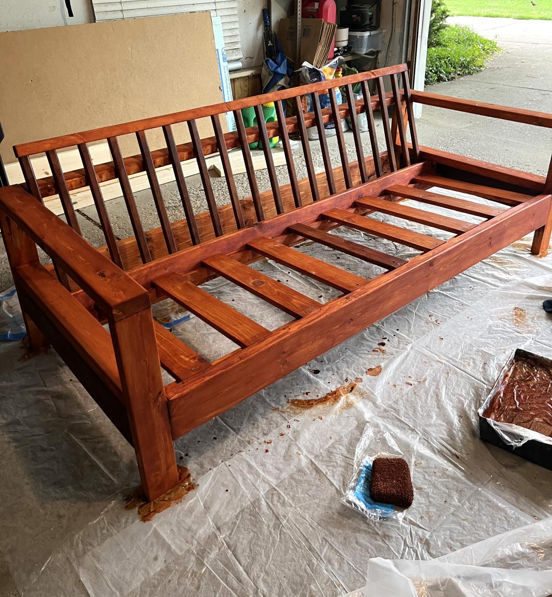 Reclaimed outdoor wood sofa with slanted back