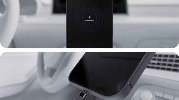 Phone showing the Android Auto Bluetooth connected screen mounted inside a car